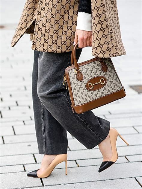 designer bags to buy if you can't afford gucci|gucci luggage.